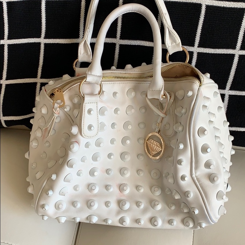 White purse with studs